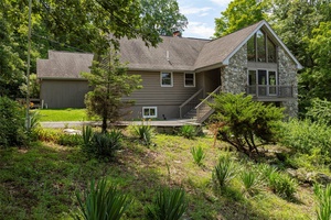 Tucked away on over 14 acres of total privacy and tranquility, 12 Wolf Lane is a contemporary retreat offering 4, 000 square feet of beautifully designed living space and every ...