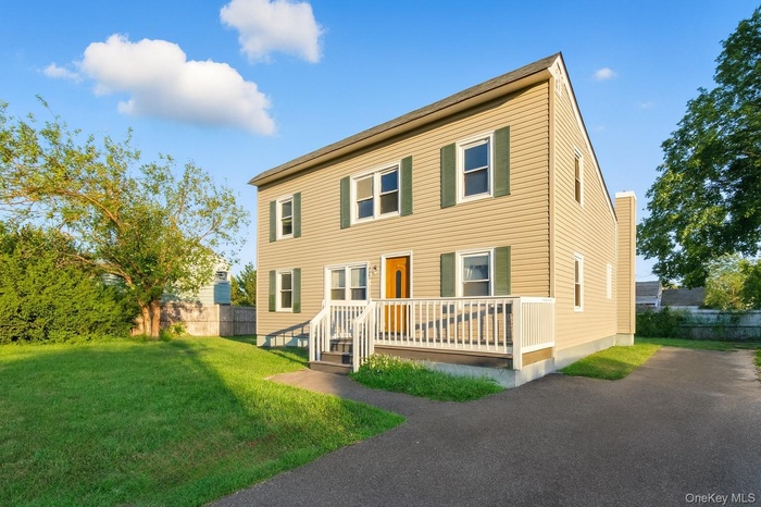 View of front of property featuring a deck