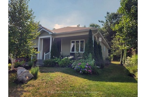 Welcome to 153 Pineridge Gate Where Style Meets Serenity in the Heart of Gravenhurst !