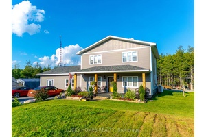 Charming 2 storey detached home in Tyendinaga, ON, where cottage style living meets modern comfort.