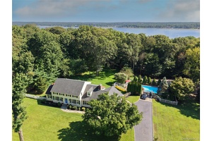 Welcome to Hawk Hill, one of Lloyd Harbor s most sought after neighborhoods, offering both beach and boat mooring rights, quiet tree lined roads, and spacious two acre parcels surrounded ...