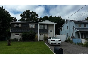 Welcome to a home that combines space, style and endless possibilities in West Babylon.