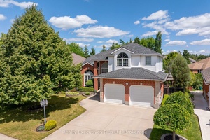 Nestled in one of the city's most prestigious communities, this Custom Built Carson Reid Home is your Forever Home !