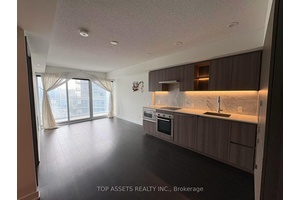 Experience luxury downtown living in this impeccably furnished 1 Bedroom Den condo, featuring high ceilings, premium finishes, laminate flooring throughout, and floor to ceiling windows offering breathtaking views of the ...