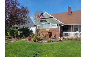 Welcome to 42 Belair Rd., a beautifully renovated four bedroom Cape nestled in the heart of East Rockaway, within the Lynbrook School District.
