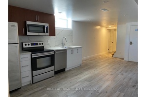 Fully Renovated 2 Bedroom Basement Apartment, with a Modern Kitchen, Stainless Steel Appliances, Built in Microwave and Dishwasher.