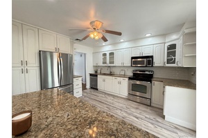 Totally renovated 4 Br, 2 bathroom, Wide line High Ranch, offering the ultimate entertaining space.