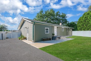 Spacious Ranch style home on a generous corner lot in the heart of Central Islip !