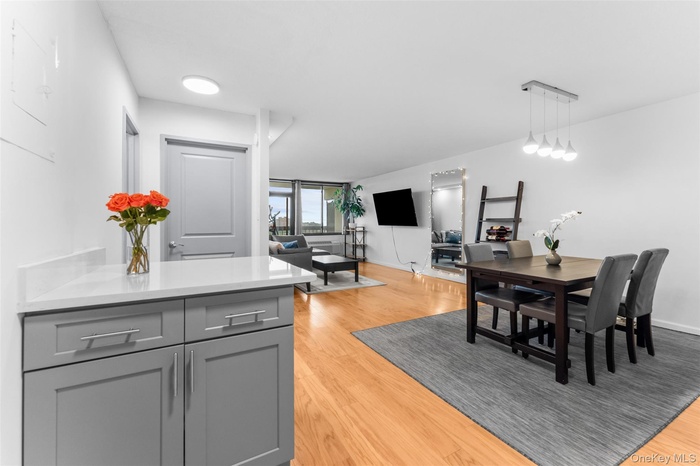 Dining area featuring light wood finished floors