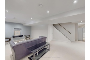 Beautiful and spacious walk out basement with separate entrance available for lease, backing onto a serene conservation ravine.