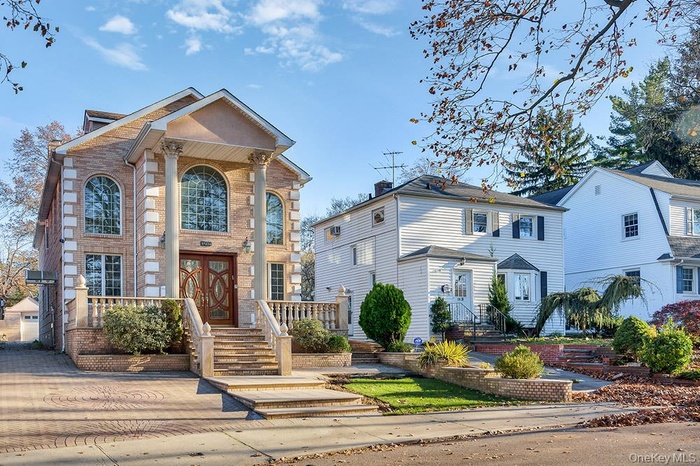 View of front of home with brick siding