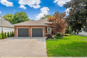 Experience elegance in this meticulously crafted 2 1 bungalow, offer 2416sf of luxurious living in Smithville's sought after south corridor.