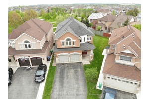 Absolutely Stunning 4 Bedroom Executive Home Backing Onto Park in Sought After Meadowvale Village !