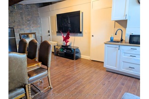 Move In Ready ! Located in the heart of downtown London, this charming triple brick building offers the perfect blend of tranquility and excitement ideal for professionals working in the ...