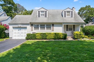 New to Market ! Welcome to this beautifully maintained home in the Garden City school district in a mid block location.