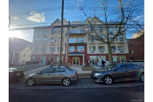 This Condo Features 2 Bedrooms, 2 Full Baths, Dining Area and Garage parking.