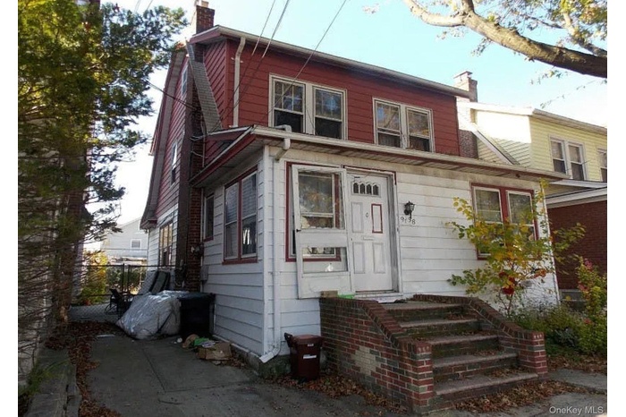 View of front of house with a chimney