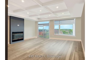 Welcome to 922 Isaac Phillips Way in Newmarket, where modern design meets executive living in this stunning 3 storey freehold townhome !
