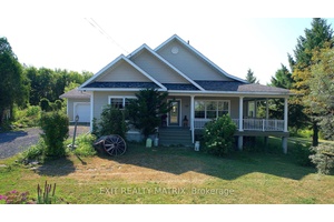 Welcome to 20306 Lochiel St, where riverfront living meets small town charm.