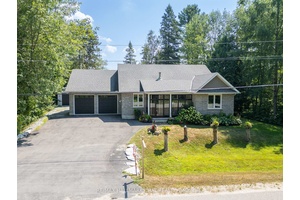 Located on the serene Black River in Ramara Township, this beautiful brick bungalow, built in 2018, offers the perfect blend of comfort, style, and waterfront living.