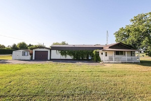 Two Bedroom, 14 x 64 modular home sits on a spacious lot, a well maintained 55 mobile home community known for its privacy, safety, and peaceful atmosphere.