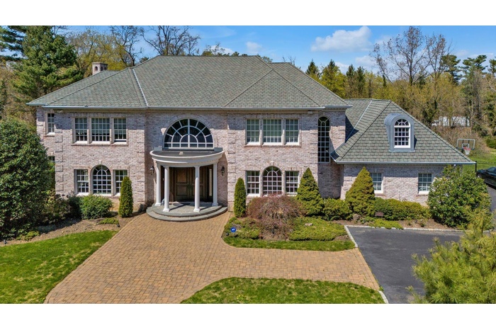 View of front of property with brick siding