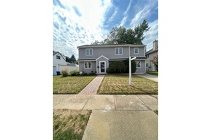 A spacious Colonial Style house with a total living area of 2, 342 sq ft offers a charming and functional layout.