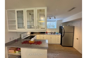 This beautifully finished basement apartment features a spacious bedroom and a private side entrance, offering the perfect setup for couples, students, or anyone seeking independent living.