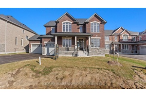 This property is a fully detached brick estate home in Riverbend Estates, featuring four bedrooms, four bathrooms, and a three car garage, which sits on a large lot.