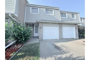 Welcome to this fully renovated 4 bedroom townhouse featuring a modern kitchen with quartz countertops, stylish backsplash, marble flooring, kitchen island dining table, and stainless steel appliances.