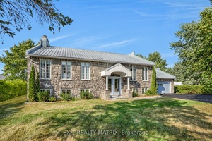 Located in the quiet community of the Domaine Chartrand.