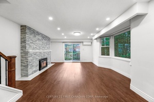 Beautifully renovated end unit townhouse offers bright, open living with stylish upgrades throughout.