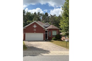 Welcome to this well maintained brick bungalow nestled in a quiet cul de sac in town.