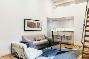 Immaculately customized and high end renovated loft like 2 bedroom, 2 bathroom plus large custom created loft space for home office storage and private terrace.