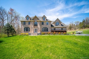 Welcome to 11 Saddle Hill Road A Perfect Blend of Luxury, Space amp ; Location This stunning brick Colonial offers the perfect balance of private luxury and everyday convenience.