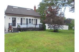 A cozy, up to date Cape home, plenty of room for extended family.