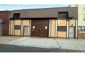 Industrial Warehouse building with over 6, 000 SqFt in sought after College Point.