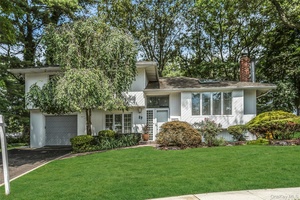Welcome to this magnificent Expanded Split Style Home, perfectly situated in a serene cul de sac on over 1 3 acre of professionally landscaped paradise in the sought after Manetto ...