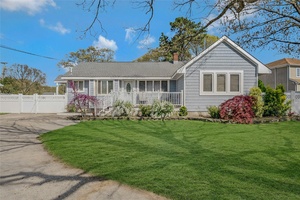 Welcome to this beautifully maintained 3 bedroom, 2 bathroom home, nestled on a spacious 0.