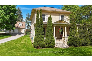 Charming Yellow Brick Century Home on an Oversized City Lot !