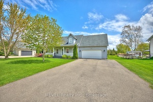 This custom built 1. 5 storey Cape Cod style home offers over 2, 300 sq ft of finished living space on a generous lot just over half an acre.