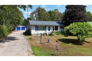 This 3 bedroom home located in Wilberforce, Ontario is only 200' away from a Public BEACH providing a sand beach and boat launch to enjoy Dark Lake which also connects ...