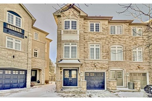 Welcome To This Well Maintained End Unit Townhouse, Offering Privacy And Plenty Of Natural Light With Large Windows.