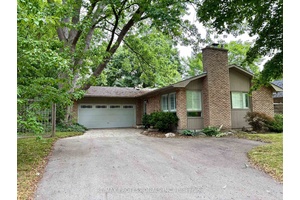Discover this bright bungalow tucked away on a serene crescent in one of Oakville's most desirable neighbourhoods.
