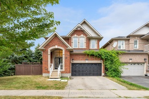 Simply stunning ! This impeccably maintained home with over 3300 sq ft total living space is perched at the edge of a crescent in the charming Clarke neighborhood.