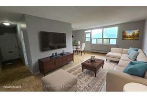 Spacious 2 Bedroom Apartment with Scenic Balcony Overlooking Berczy Park Now Available for Rent.