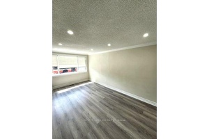 For Lease on the Main Floor of A Detached House on a Huge Lot 50 x 140 Ft.
