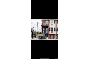 Excellent investment property, 3 Family house features 9 Bedrooms, 6 Full Bathrooms, Living Dining, and Eat in Kitchen.
