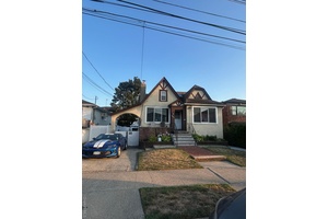 Welcome to this delightful two family home located in the heart of Howard Beach !