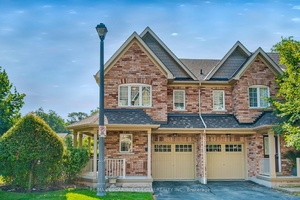 Step into this stunning 3 bedroom END Unit Townhome offering over 1, 800 sq ft of beautifully finished living space, including a bright walk out finished basement !